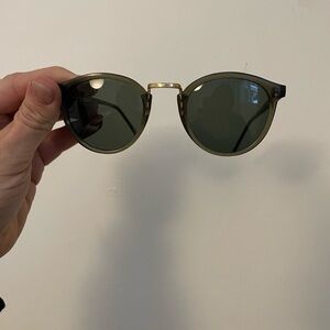 Timeless Round Sunglasses with Green Lenses